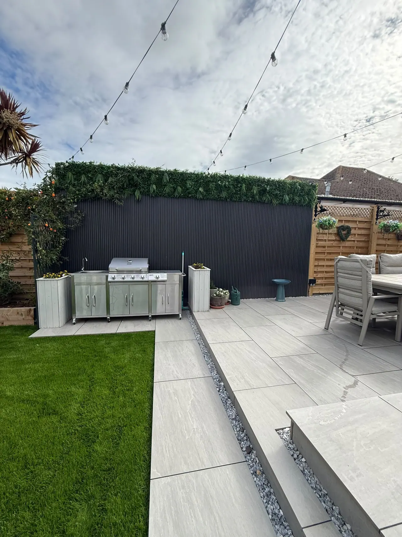 Fencing in Southend-on-Sea – Completed porcelain patio, new fencing and lawn in a Southend-on-Sea garden