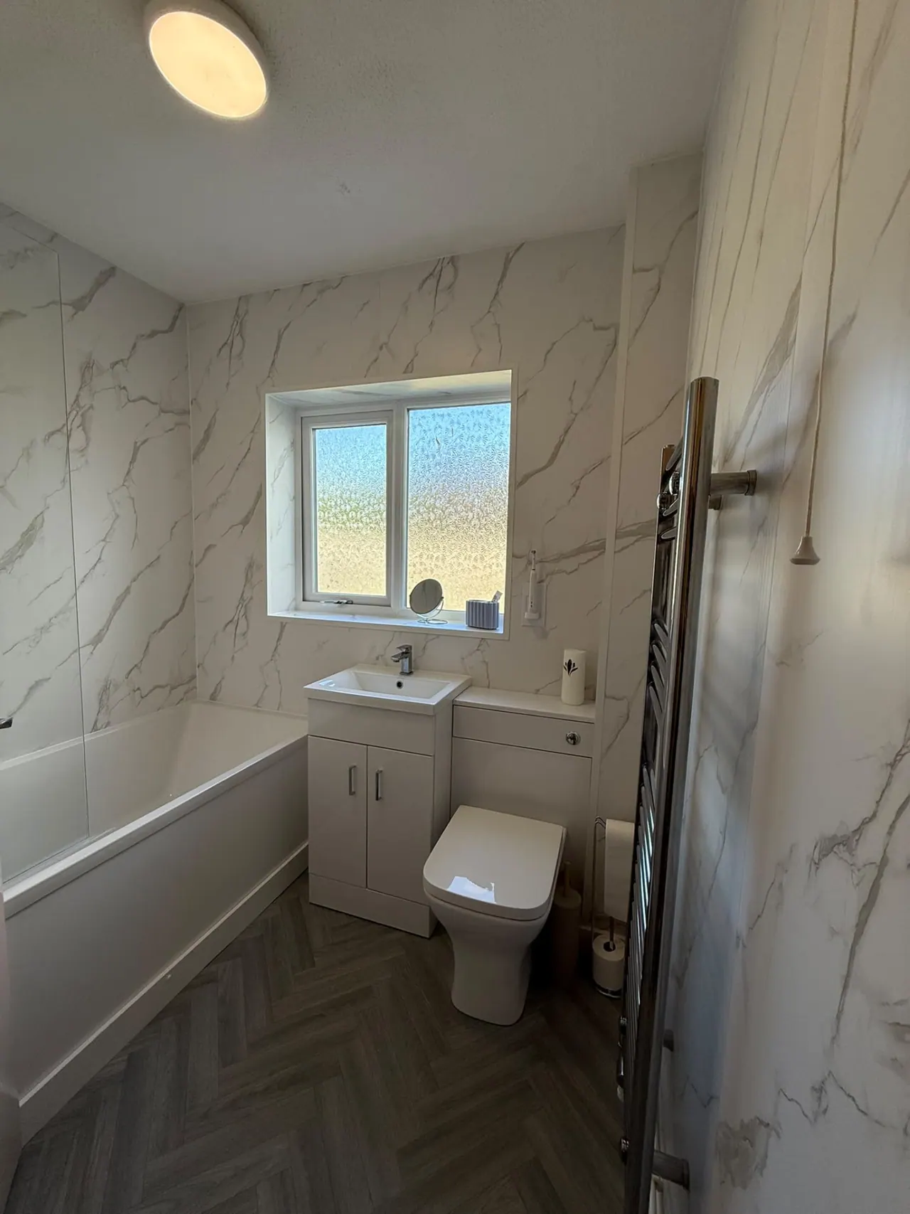 Completed bathroom renovation in Southend-on-Sea with new tiling, sanitaryware and shower