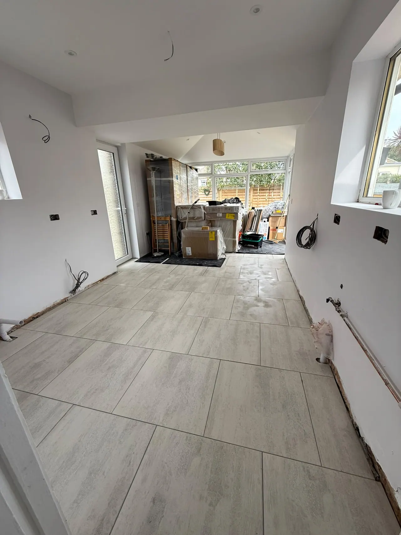 Tiling in Southend-on-Sea – Large-format floor tiling completed in an open-plan room in Essex