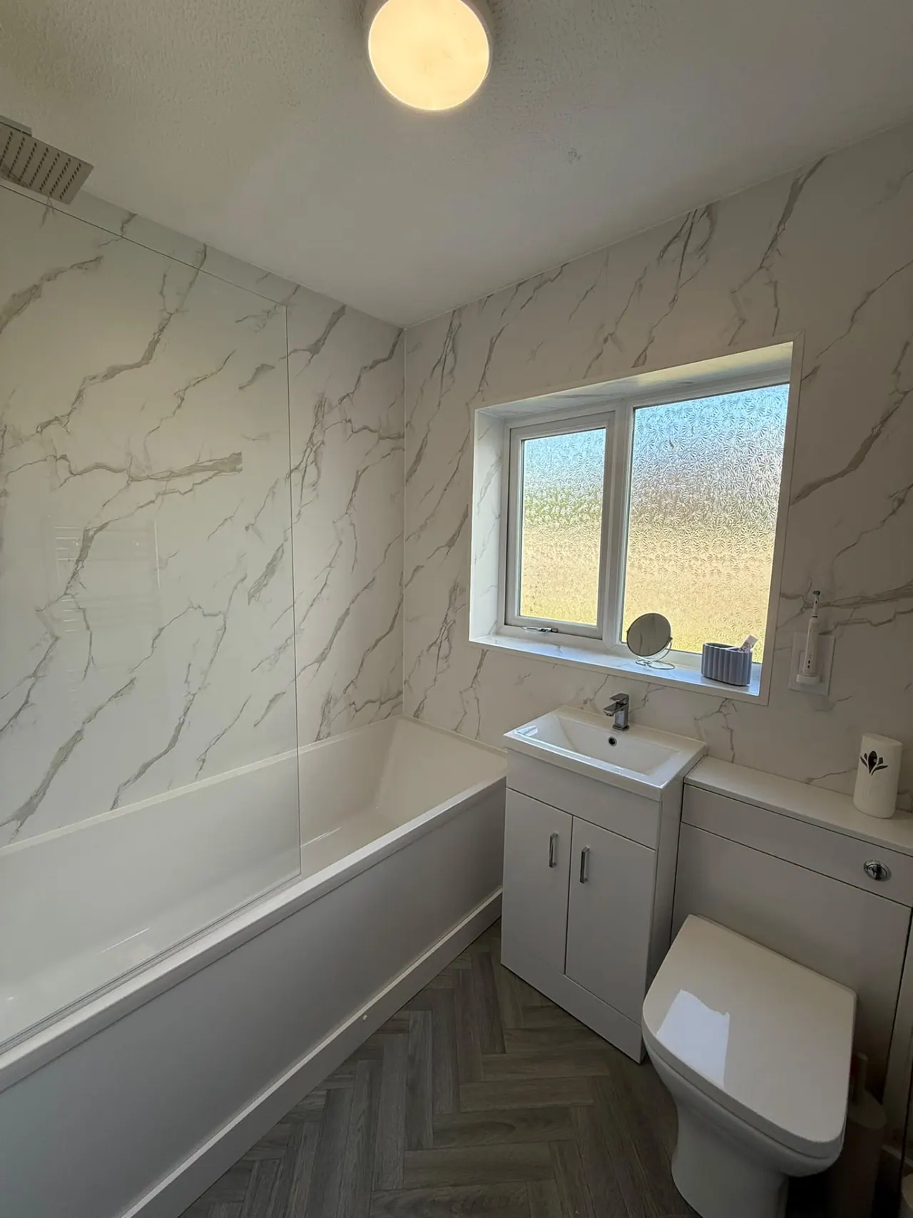 Completed bathroom renovation in Southend-on-Sea with new tiling, sanitaryware and shower