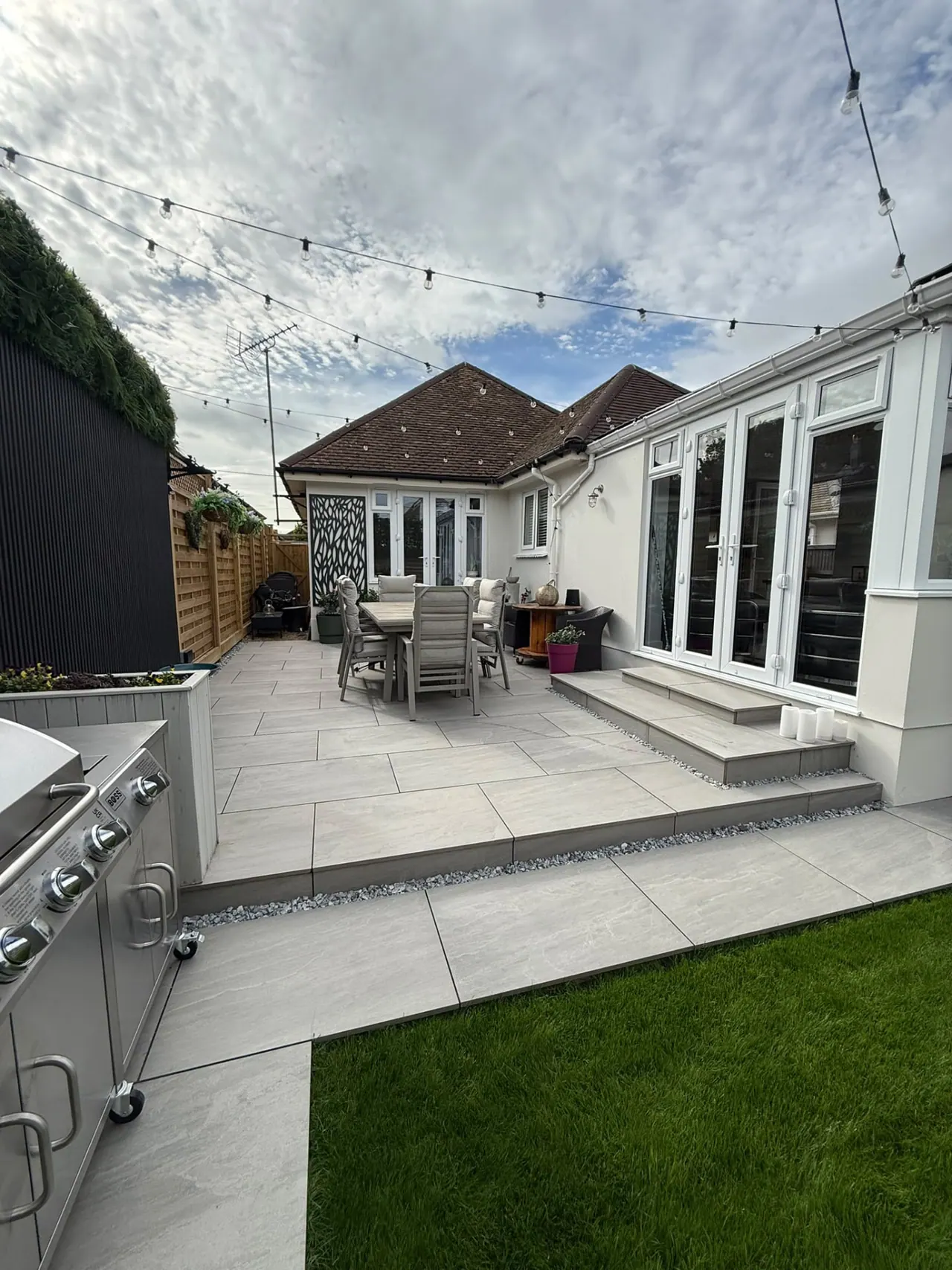 Completed porcelain patio, new fencing and lawn in a Southend-on-Sea garden