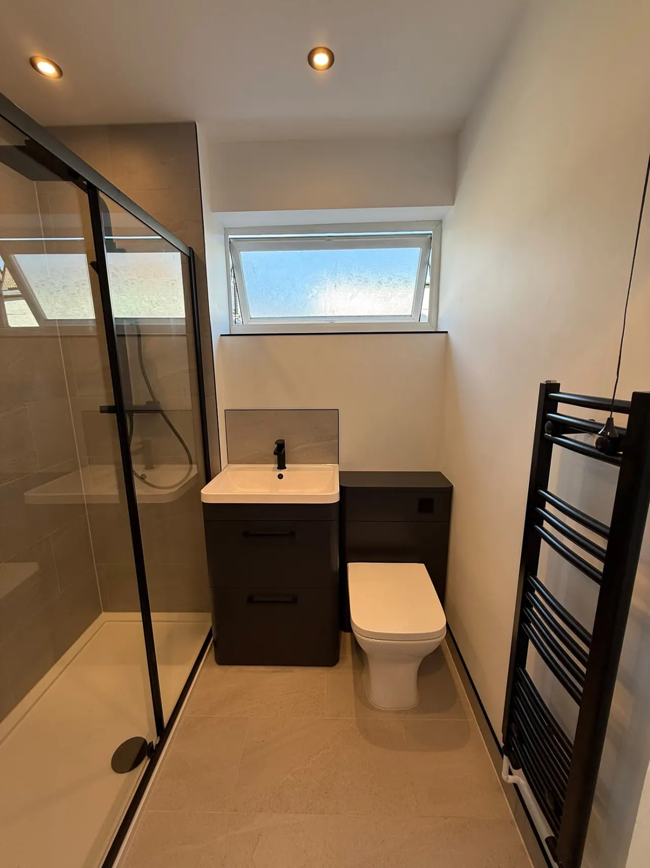 Completed bathroom renovation in Southend-on-Sea with new tiling, sanitaryware and shower