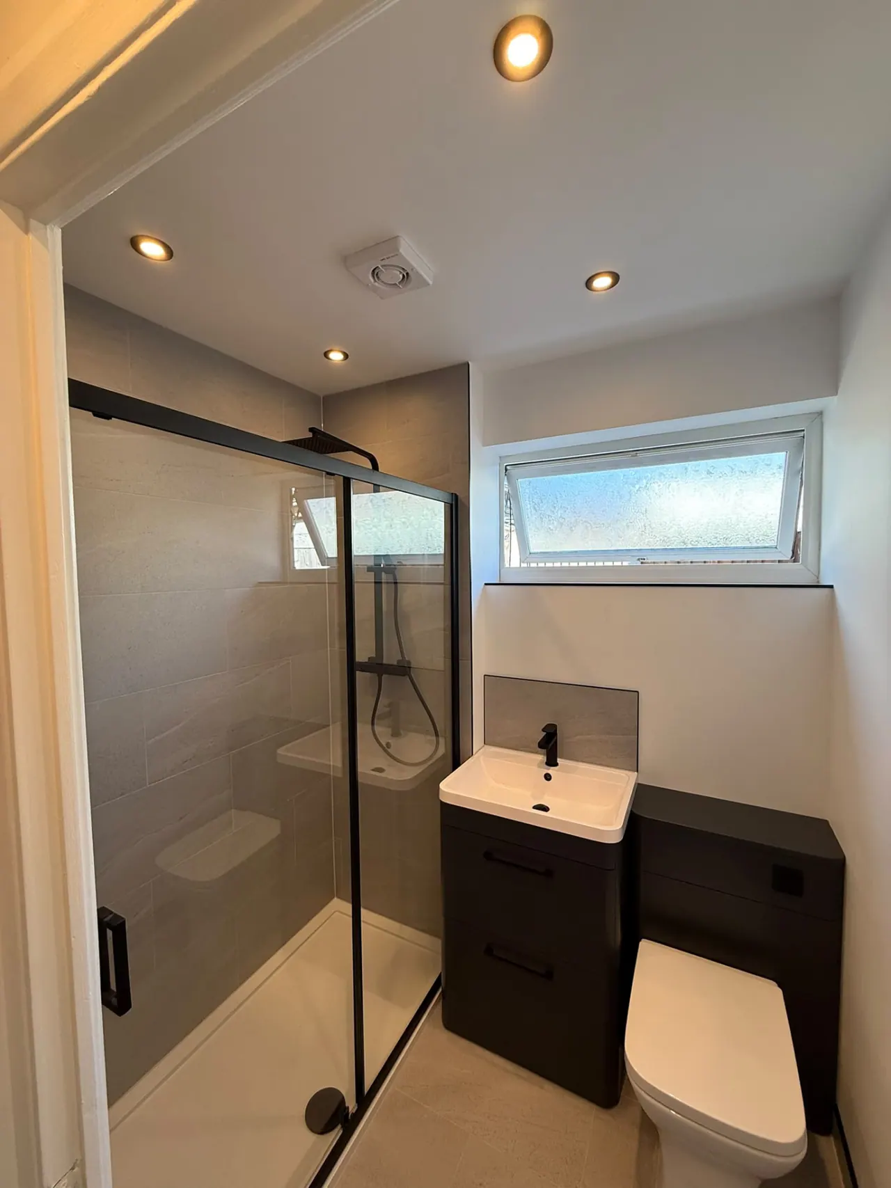 Completed bathroom renovation in Southend-on-Sea with new tiling, sanitaryware and shower