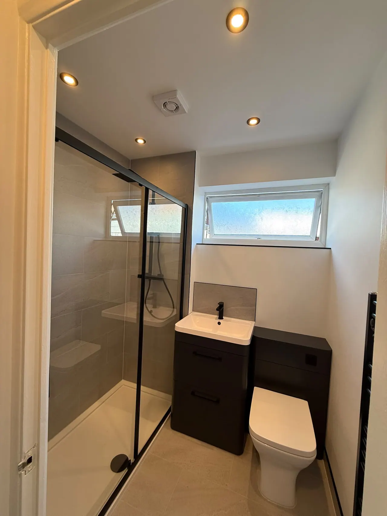 Completed bathroom renovation in Southend-on-Sea with new tiling, sanitaryware and shower